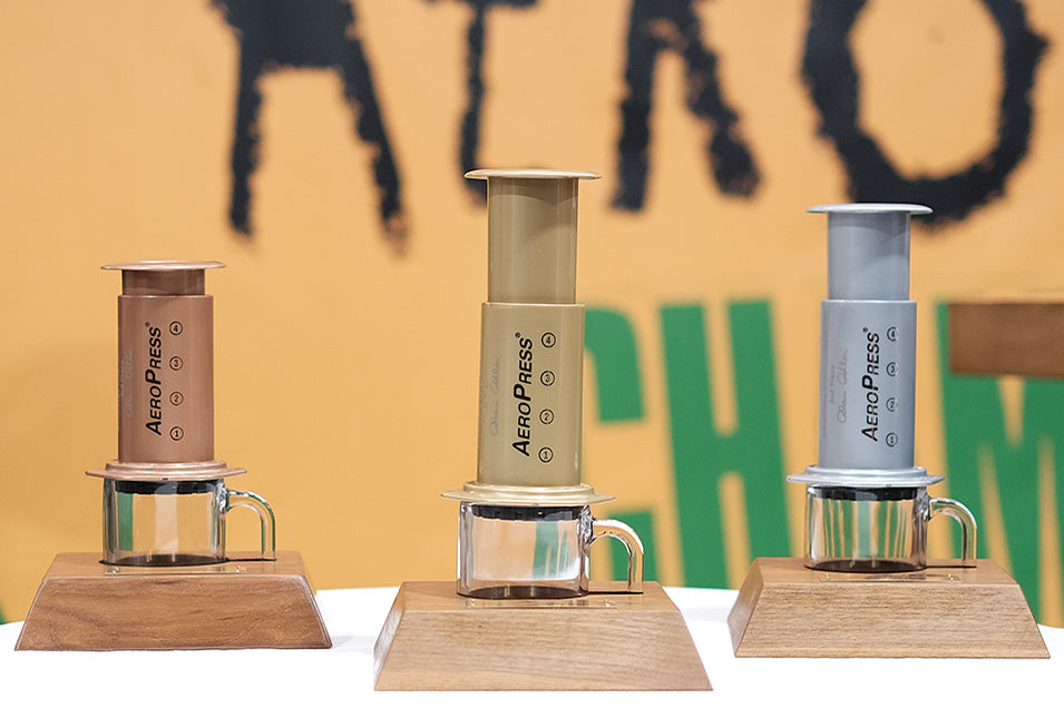 3 2021 World AeroPress Championship trophies on display bases