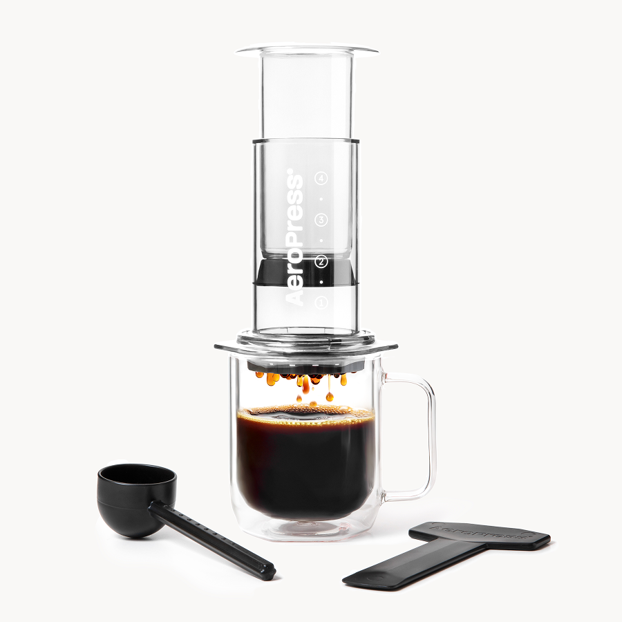 AeroPress Coffee Maker - Clear on glass coffee mug #color_clear