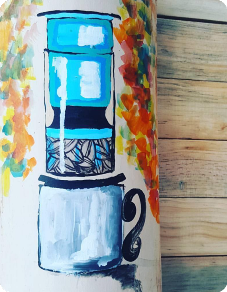 Painting of blue AeroPress on pole