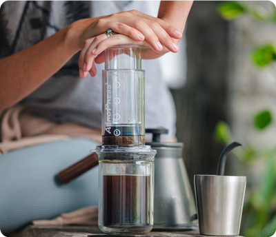 Pressing AeroPress Clear outside