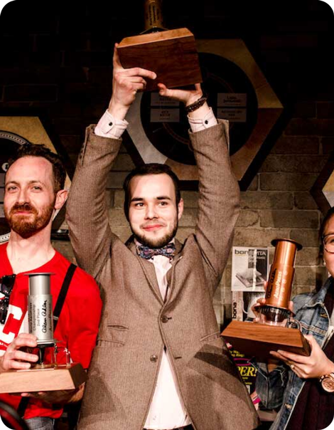 2015 World AeroPress Champions with trophies