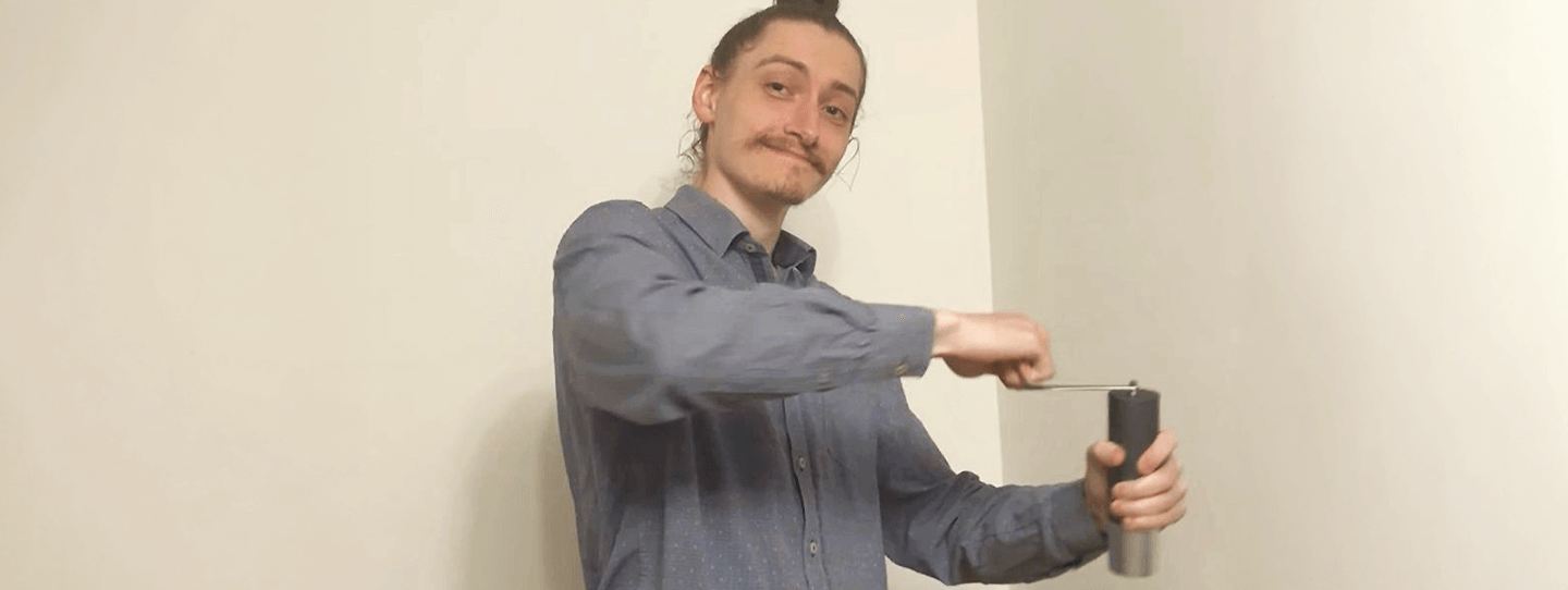 Oliver Carlton using the AeroPress Manual Grinder