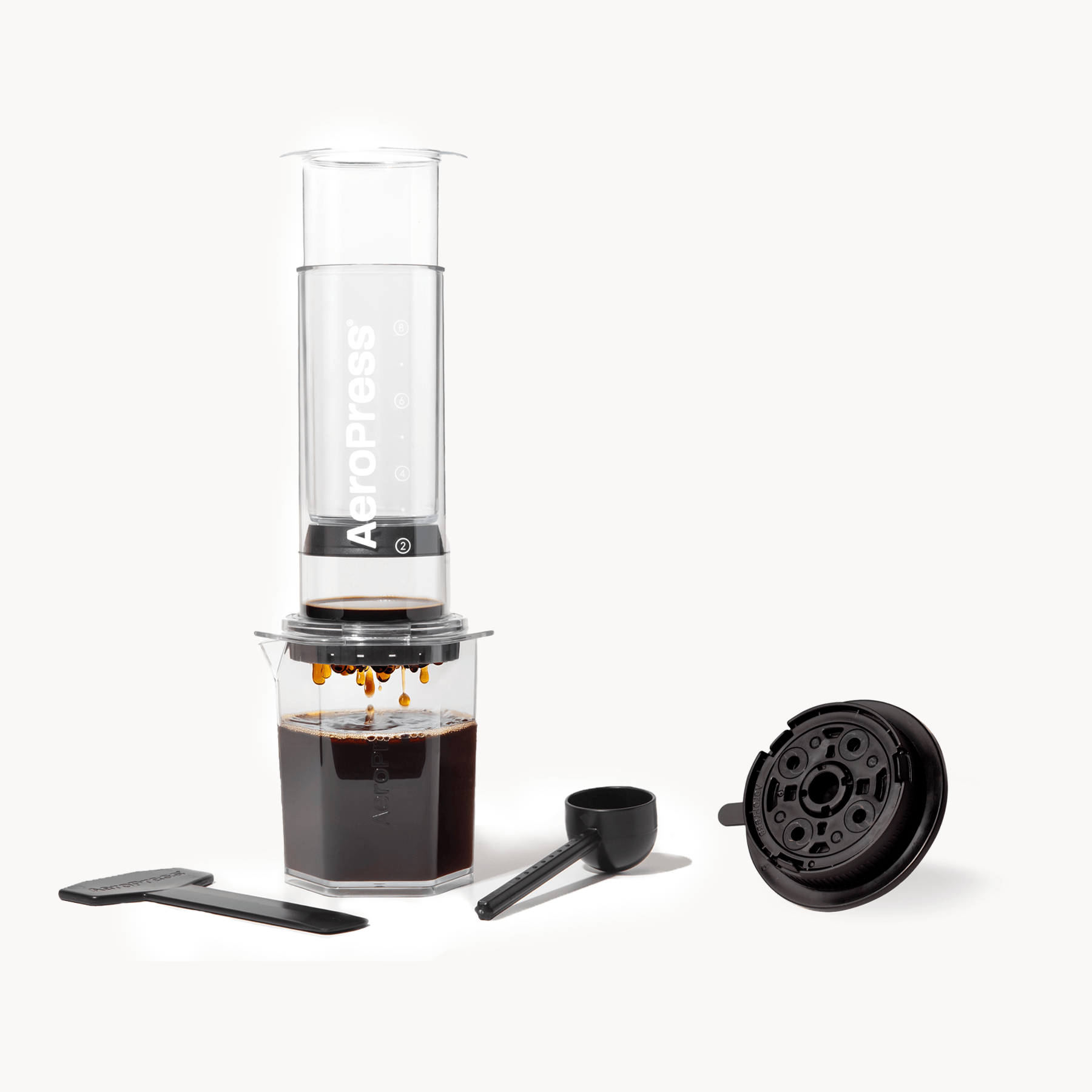 AeroPress Clear XL coffee maker with Variable flow control cap on a white background