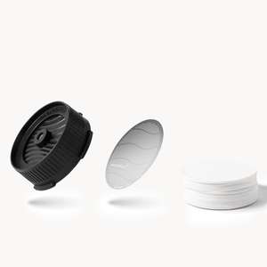 AeroPress Flow Control Cap, Stainless Steel Filter and paper micro-filters on a white background