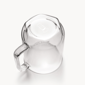 Clear glass mug on a white background