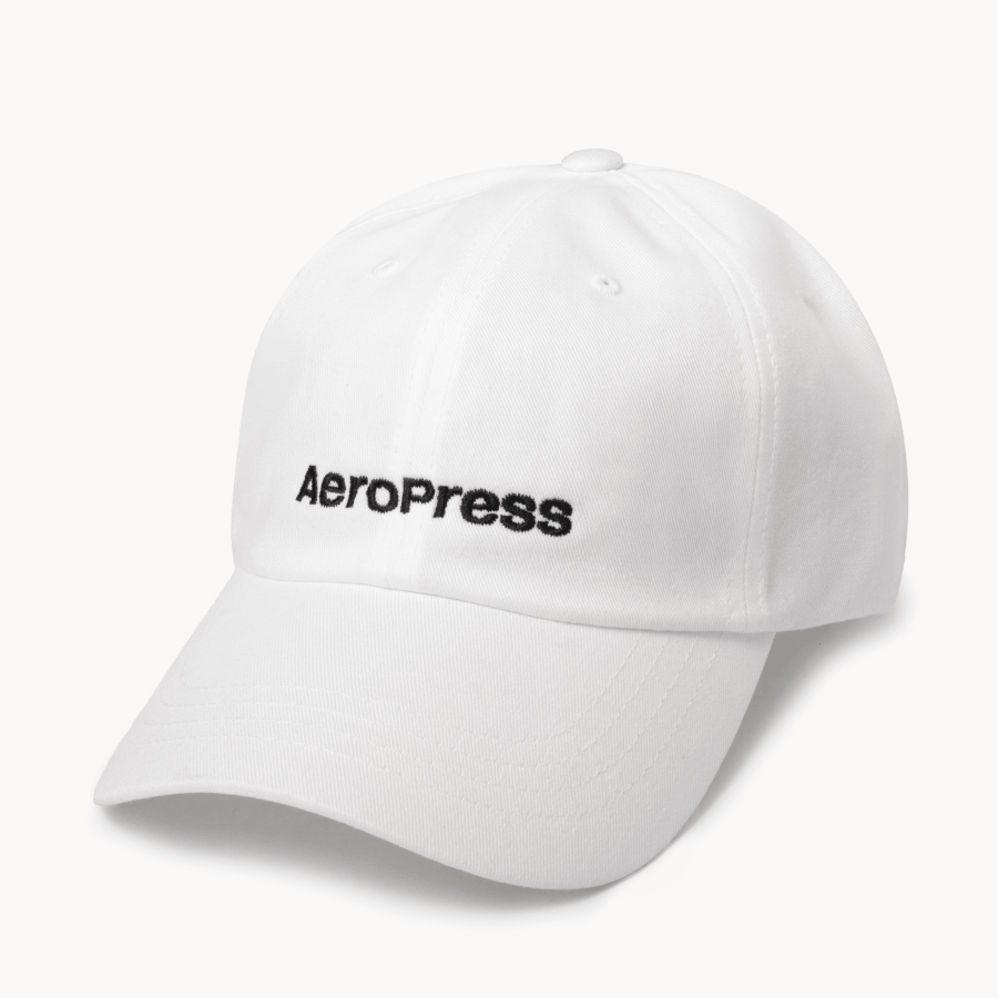 White cap with AeroPress logo on a white background #color_white