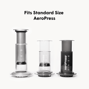 Three AeroPress coffee makers on a white background with text indicating compatibility.