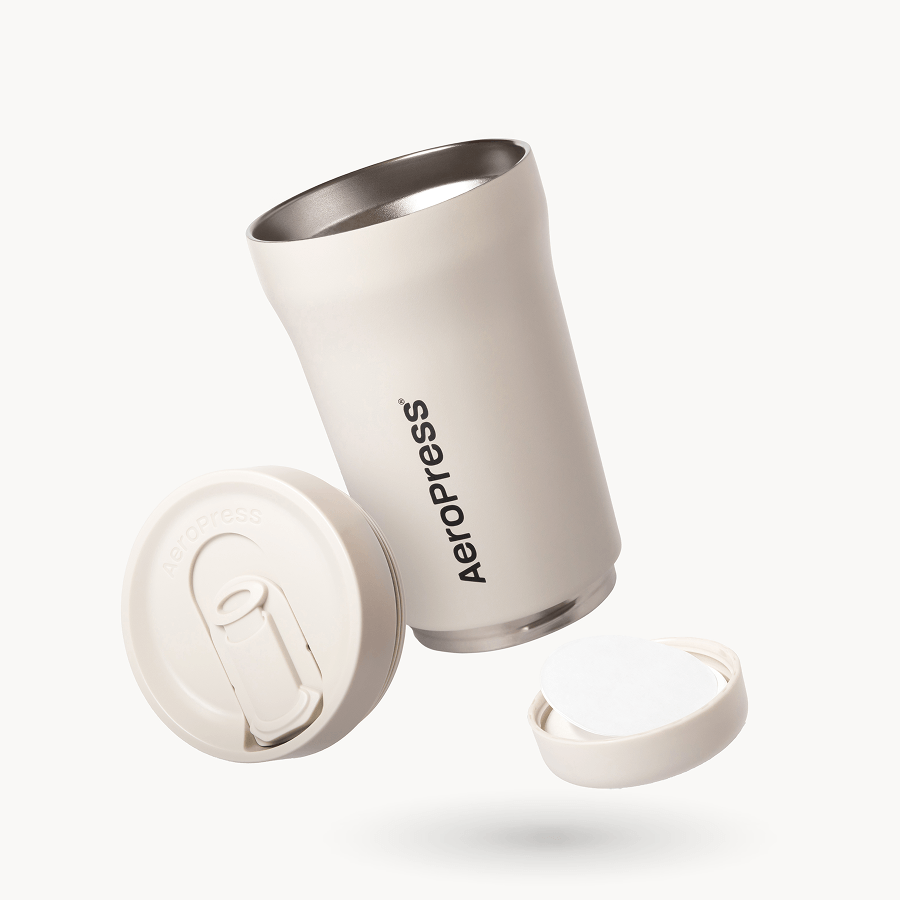 AeroPress Tumbler with components on a white background #color_cream