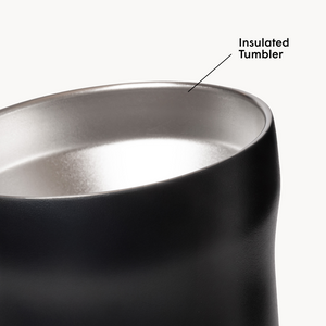 Black insulated tumbler with metallic interior on a white background 