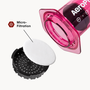 Close up of Clear Pink filter cap and filter on a white background #color_pink