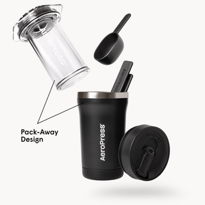 AeroPress Go Plus coffee maker with components on a white background #color_black