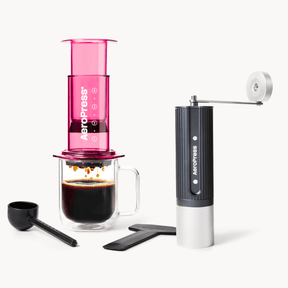 Aeropress coffee maker with pink top and black and white body on a white background #color_Pink
