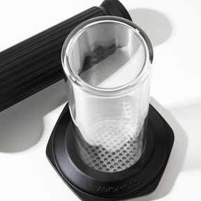 Glass AeroPress Premium coffee maker chamber on a white background #color_black