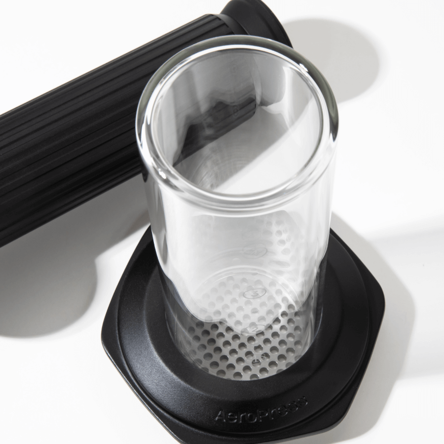 Glass AeroPress Premium coffee maker chamber on a white background #color_black