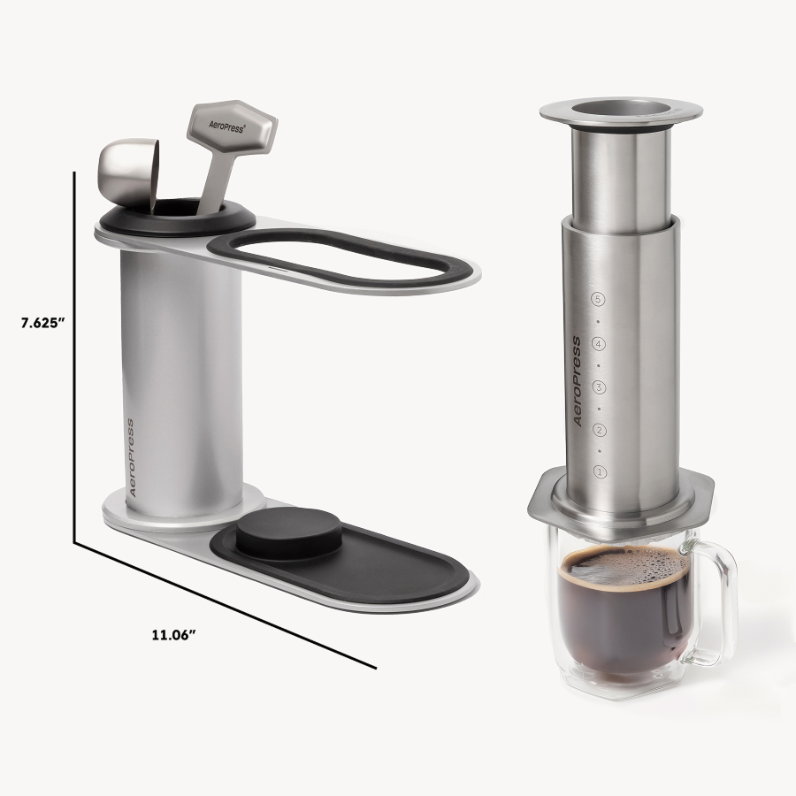 Aeropress coffee maker with dimensions and a cup of coffee on a white background #color_silver
