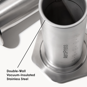 AeroPress coffee maker with double-wall vacuum-insulated stainless steel design on a white background #color_silver
