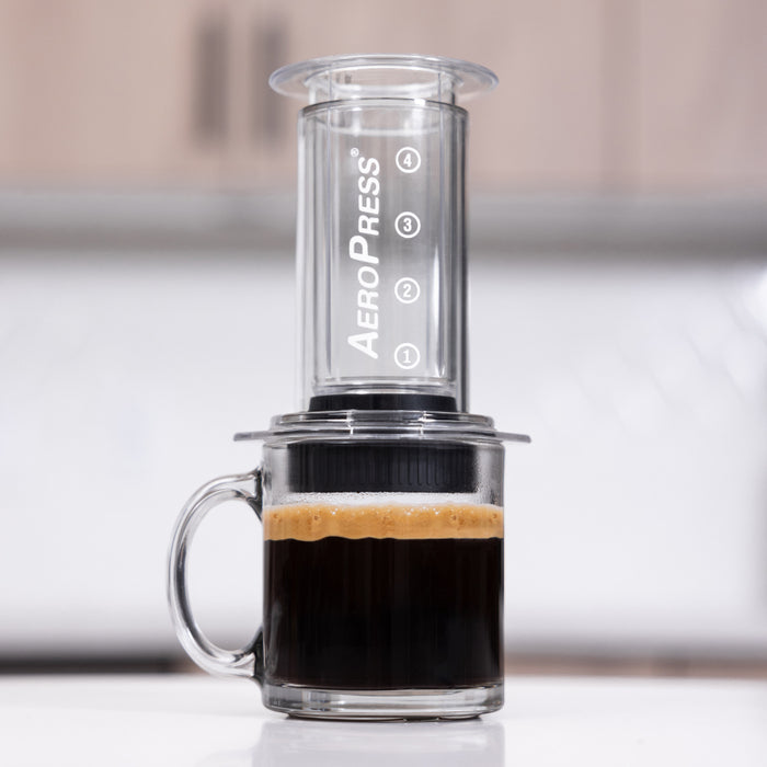 https://aeropress.com/cdn/shop/files/AeroPress_Clear_FCC_2023_AA-210_1x1_700x_5cc2f8b3-8a7c-42e9-9ccd-c32fbf2ccfd2_700x.jpg?v=1698782375