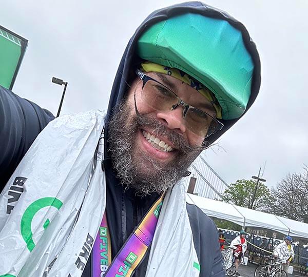 Person posing at a bike race