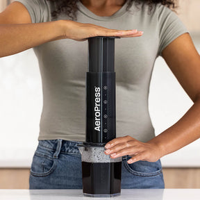 Woman brewing with AeroPress XL