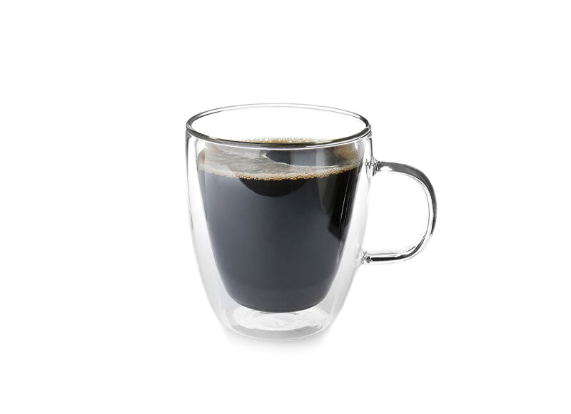 A glass containing black coffee