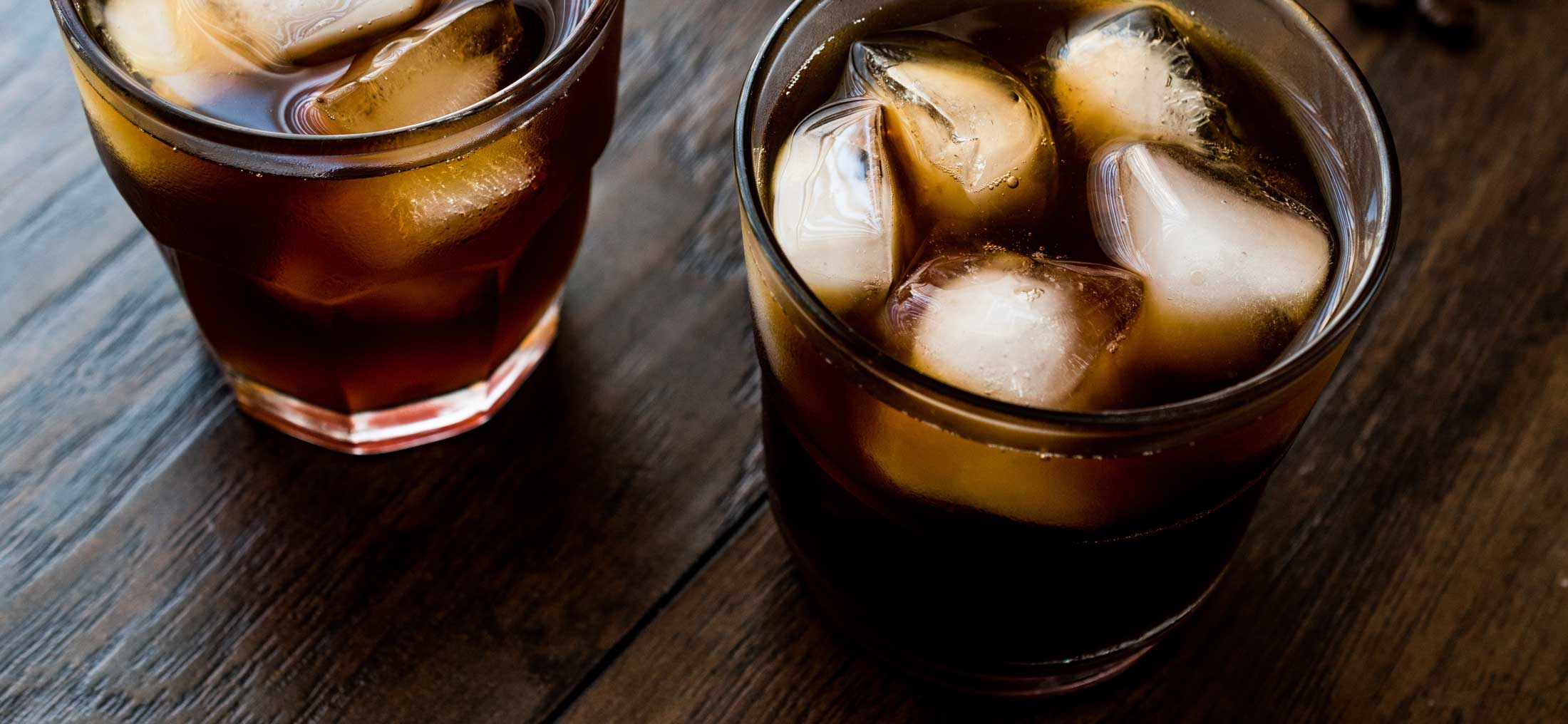Two glasses of cold brew coffee with ice