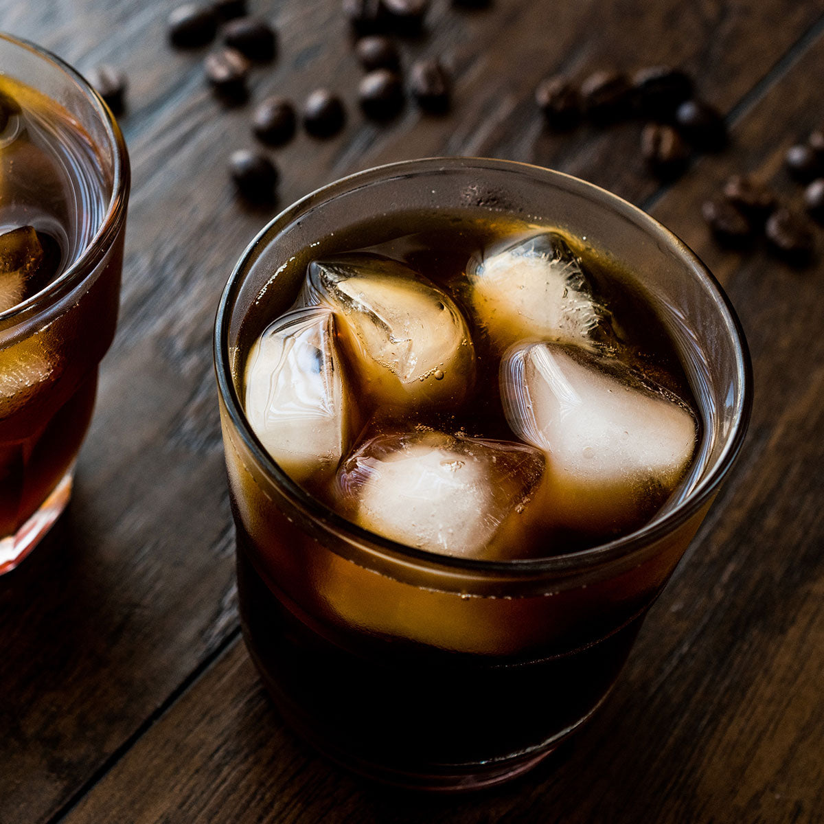 Photo of cold brew coffee with ice in a glass
